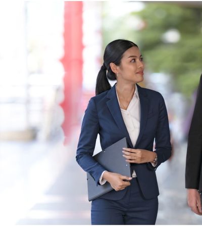 Business man and woman walking